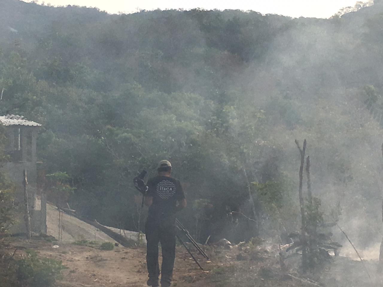 Shooting in smoke-covered field in Santa Maria, Jicaltepec, OAxaca, MEXICO